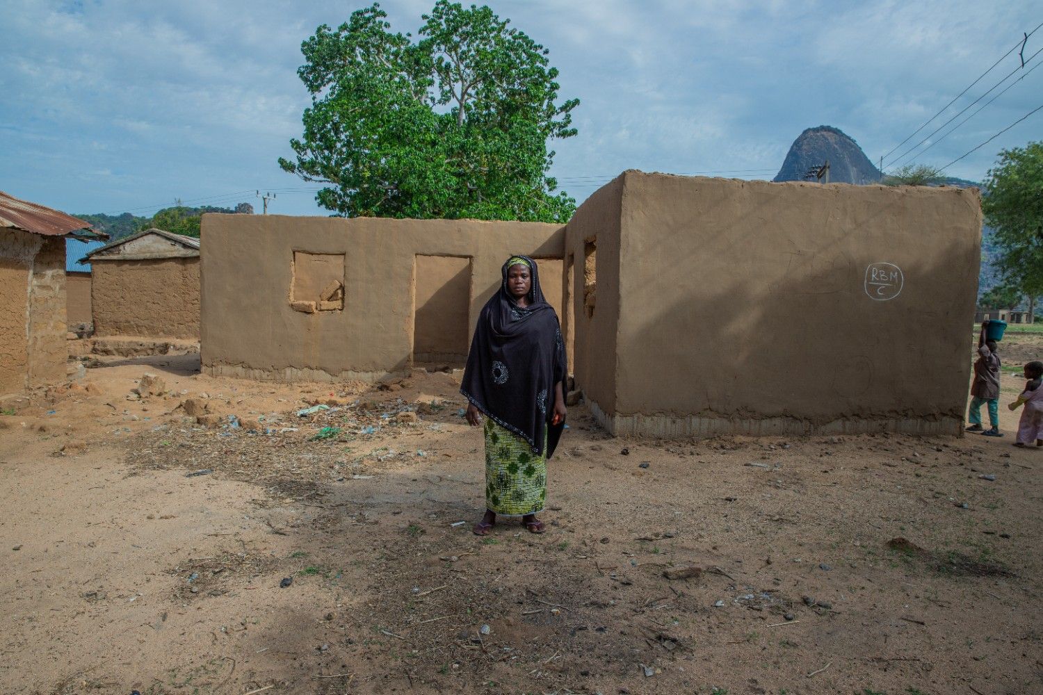 MaryamYunusaAWEGBeneficiaryWhoUseProceedsFromHerWEGContributiontoIncreaseHerRiceBusinessfromWhichSheisNowBuildingHerHouse